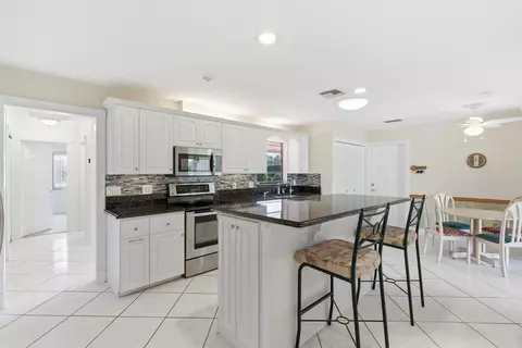 Kitchen - 5151 SE Burning Tree Cir, Stuart, FL 34997 photo 1 of 7