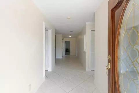Entry Way - 5151 SE Burning Tree Cir, Stuart, FL 34997 photo 1 of 2