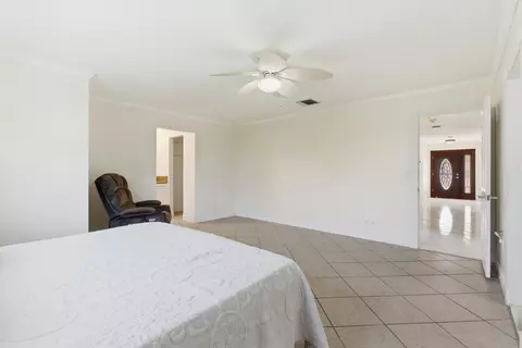 Bedroom - 5151 SE Burning Tree Cir, Stuart, FL 34997 photo 5 of 10