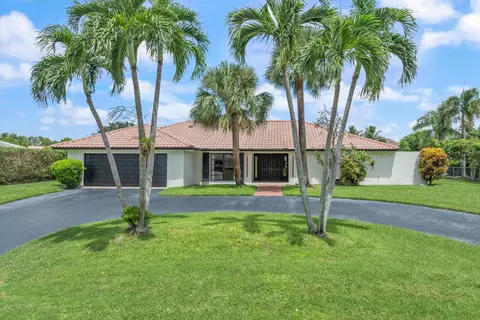 516 Muirfield Dr, Atlantis, FL 33462