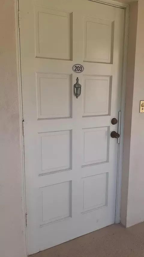 Entry Way - 2601 S Course Dr #203, Pompano Beach, FL 33069 photo 2 of 3