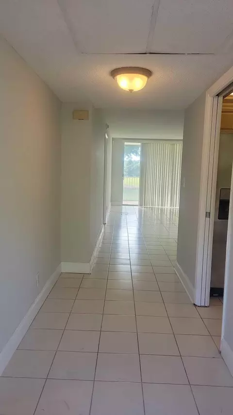Entry Way - 2601 S Course Dr #203, Pompano Beach, FL 33069 photo 3 of 3