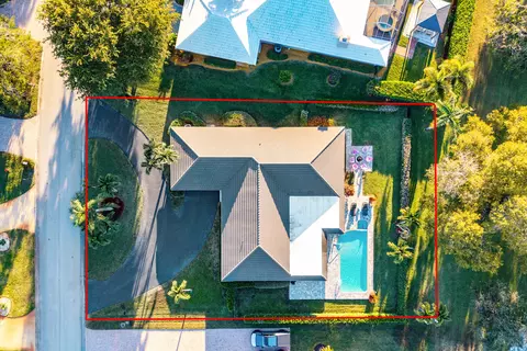 413 S Country Club Dr, Atlantis, FL 33462