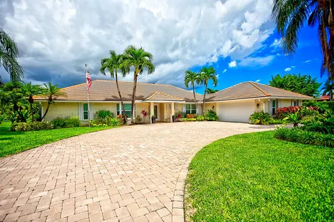 455 S Country Club Dr, Atlantis, FL 33462
