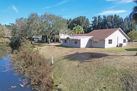 Exterior - 8074 SE River Ln, Stuart, FL 34997 photo 7 of 11