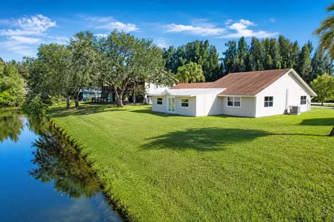 Exterior - 8074 SE River Ln, Stuart, FL 34997 photo 5 of 11