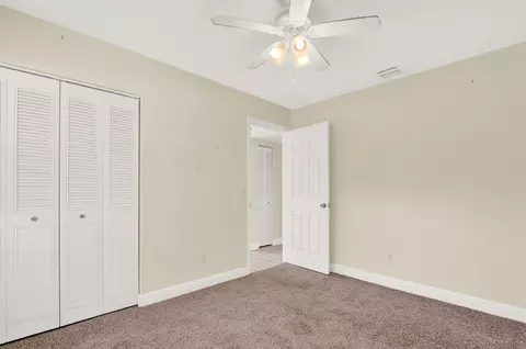 Bedroom - 8074 SE River Ln, Stuart, FL 34997 photo 6 of 8