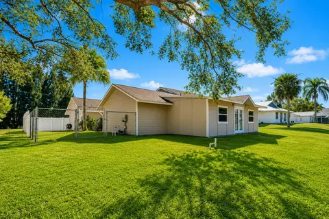 Exterior - 8074 SE River Ln, Stuart, FL 34997 photo 4 of 11