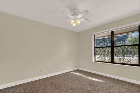 Bedroom - 8074 SE River Ln, Stuart, FL 34997 photo 5 of 8