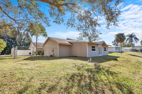 Exterior - 8074 SE River Ln, Stuart, FL 34997 photo 6 of 11
