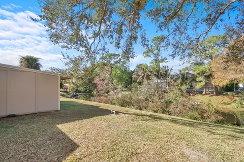Exterior - 8074 SE River Ln, Stuart, FL 34997 photo 5 of 11