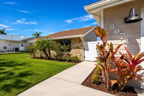 Exterior - 8074 SE River Ln, Stuart, FL 34997 photo 2 of 11