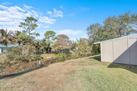 Exterior - 8074 SE River Ln, Stuart, FL 34997 photo 8 of 11