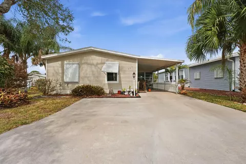 566 Dolphin Cir, Barefoot Bay, FL 32976