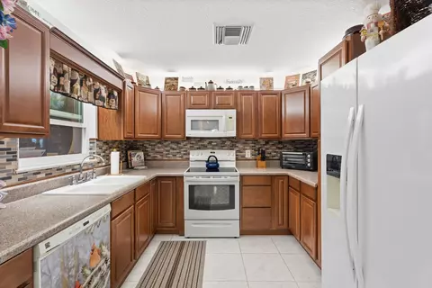 Kitchen - 1341 SE Seashell Ln, Stuart, FL 34996 photo 1 of 1