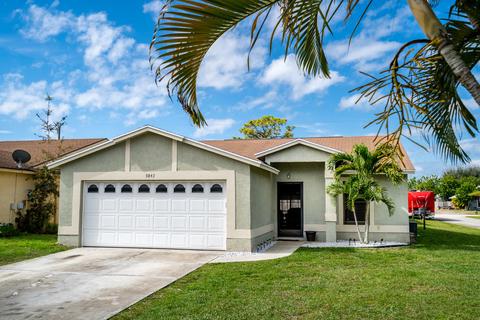 5843 SE Grafton Dr, Stuart, FL 34997 photo 1
