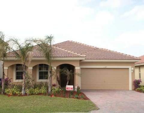 1147 SE Kirk St, Stuart, FL 34997 photo 1