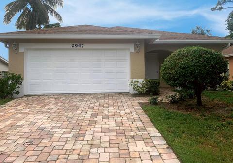 2947 SE Delmar St, Stuart, FL 34997 photo 1