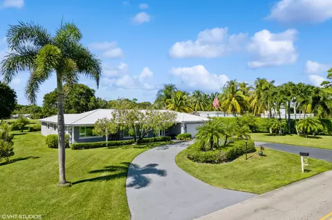 285 N Country Club Dr, Atlantis, FL 33462