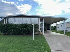 910 Periwinkle Cir, Barefoot Bay, FL 32976