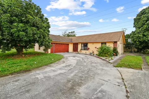 301 Canterbury Dr W, Riviera Beach, FL 33407