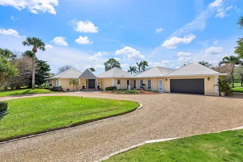 261 N Country Club Dr, Atlantis, FL 33462