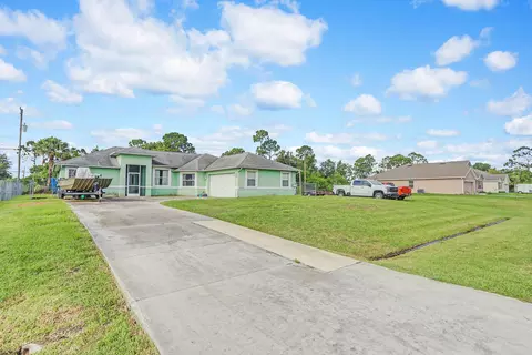 1066 SW Calmar Ave, Port Saint Lucie, FL 34953
