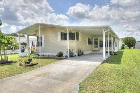 561 Dolphin Cir, Barefoot Bay, FL 32976