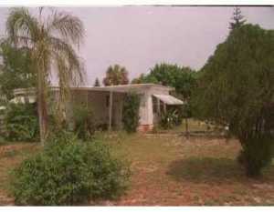 497 SE Tejon St, Stuart, FL 34994 photo 1
