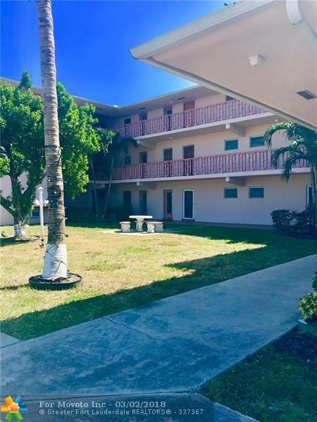 1480 E Sample Rd #303, Pompano Beach, FL 33064 photo 1
