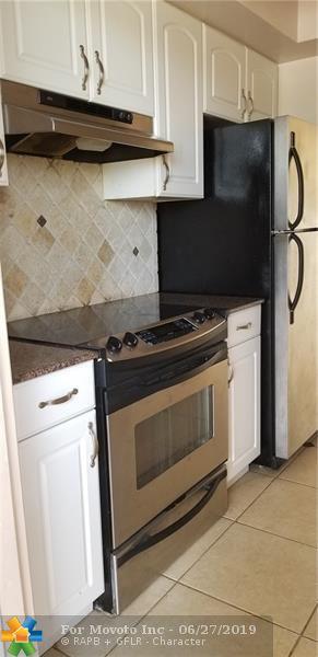 1050 E Sample Rd #207, Pompano Beach, FL 33064 photo 1