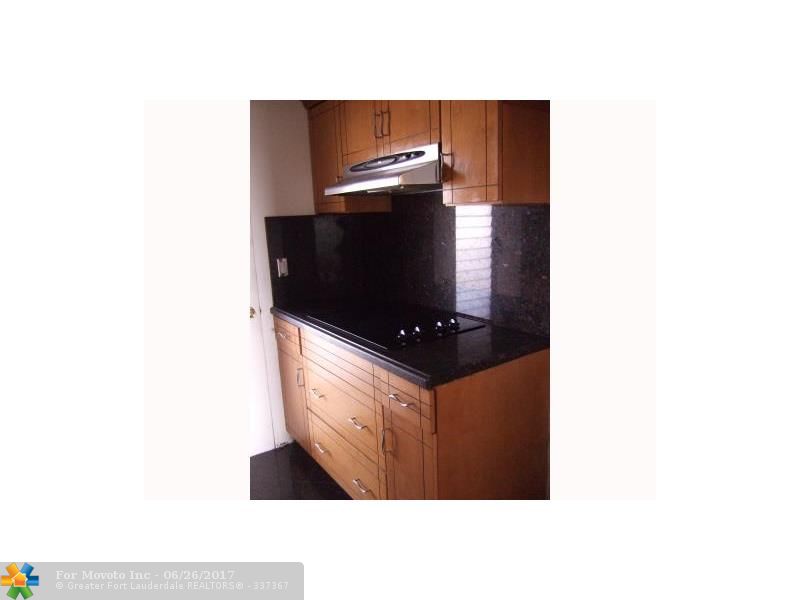 1350 E Sample Rd #307, Pompano Beach, FL 33064 photo 1