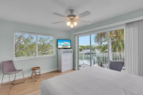 Bedroom - 315 E Ocean Dr, Key Colony, FL 33051 photo 1 of 6