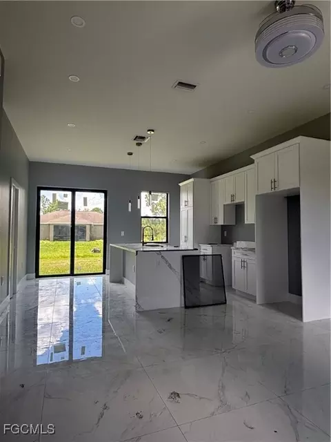 1034 Iris St E, Lehigh Acres, FL 33974 photo 2