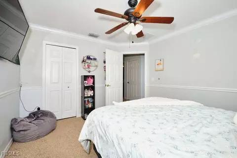 Bedroom - 2002 Heatherstone Way #1, Estero, FL 33928 photo 10 of 10