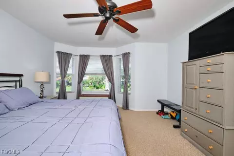 Bedroom - 2002 Heatherstone Way #1, Estero, FL 33928 photo 3 of 10