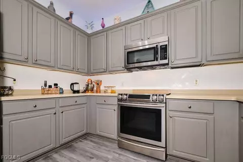 Kitchen - 2002 Heatherstone Way #1, Estero, FL 33928 photo 3 of 4