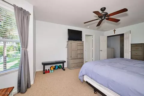 Bedroom - 2002 Heatherstone Way #1, Estero, FL 33928 photo 4 of 10