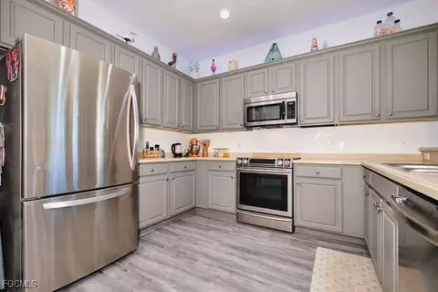 Kitchen - 2002 Heatherstone Way #1, Estero, FL 33928 photo 2 of 4