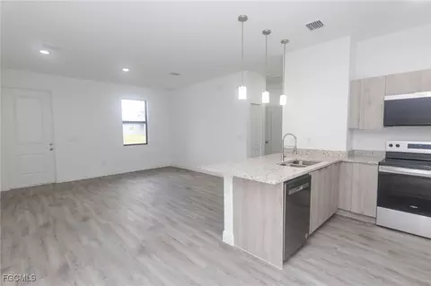 Living - 6027 Pecan Cir, Labelle, FL 33935 photo 1 of 2