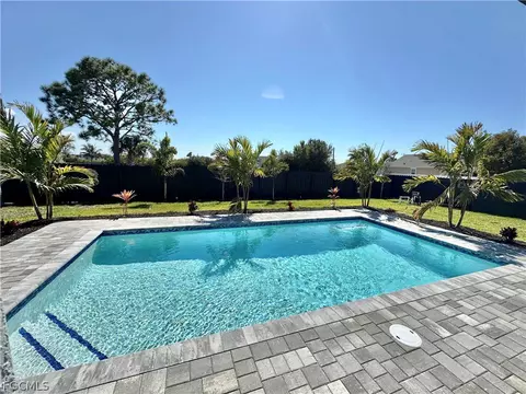 Exterior - 1016 NW 24th Ave, Cape Coral, FL 33993 photo 4 of 5