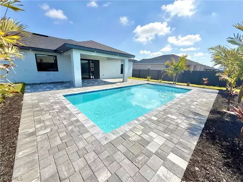 Exterior - 1016 NW 24th Ave, Cape Coral, FL 33993 photo 3 of 5