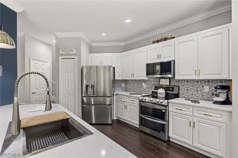 Kitchen - 9154 Estero River Cir, Estero, FL 33928 photo 4 of 4
