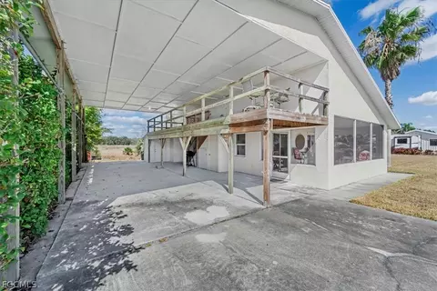 Exterior - 1079 Lock Ln, Moore Haven, FL 33471 photo 7 of 13