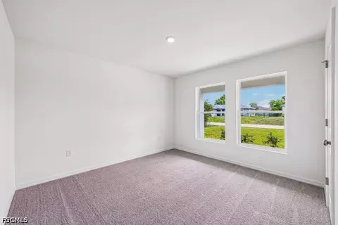 Bedroom - 831 Lamar St E, Lehigh Acres, FL 33974 photo 5 of 5