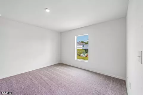Bedroom - 831 Lamar St E, Lehigh Acres, FL 33974 photo 3 of 5