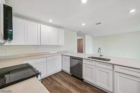 Kitchen - 831 Lamar St E, Lehigh Acres, FL 33974 photo 2 of 2