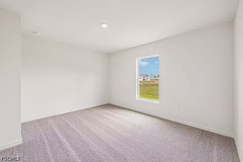 Bedroom - 831 Lamar St E, Lehigh Acres, FL 33974 photo 1 of 5