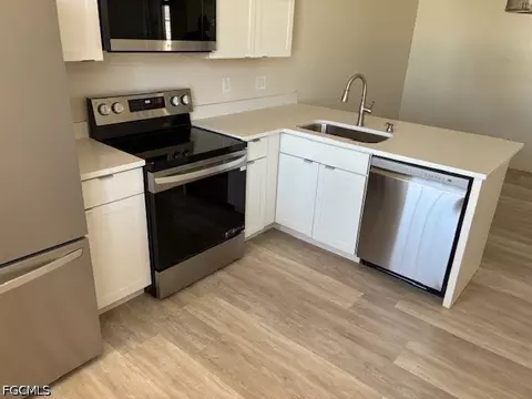 Kitchen - 9750 Sassafras Ct, Estero, FL 33928 photo 2 of 3