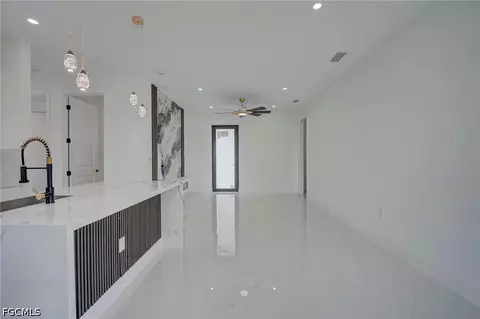 Living - 1004 Pine Ave, Lehigh Acres, FL 33972 photo 2 of 3